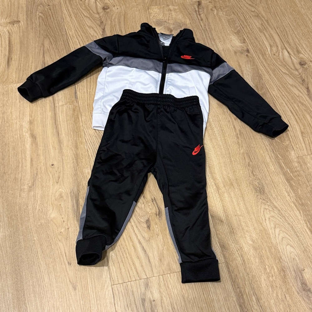 Nike Black and White Tracksuit with Red Logo